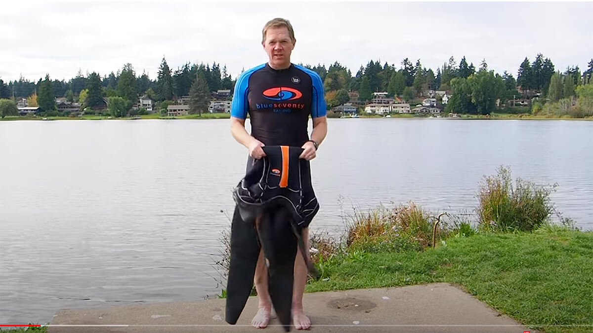 Load video: How to put on a wetsuit video.